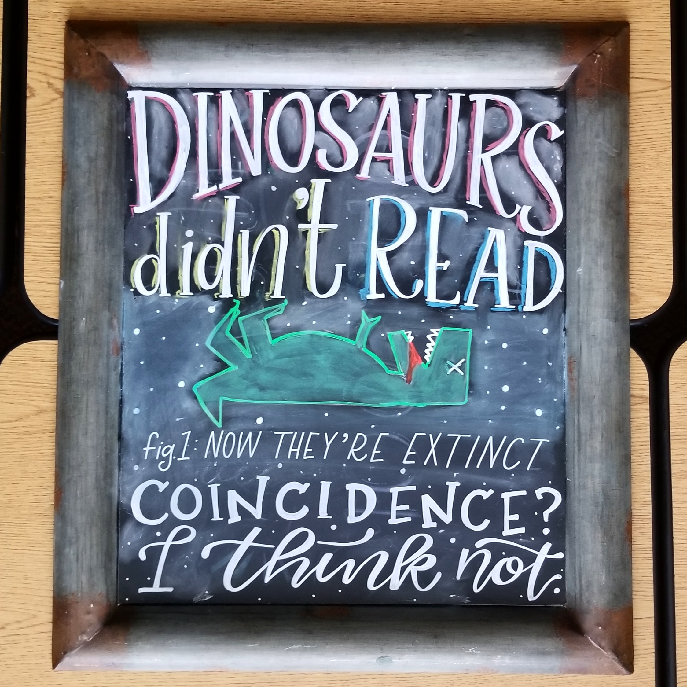 Dinosaurs didn't read library chalkboard